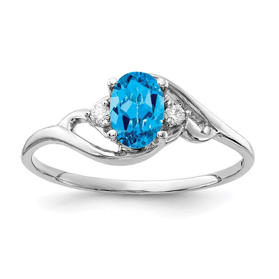 14K White Gold Oval Blue Topaz A Diamond ring