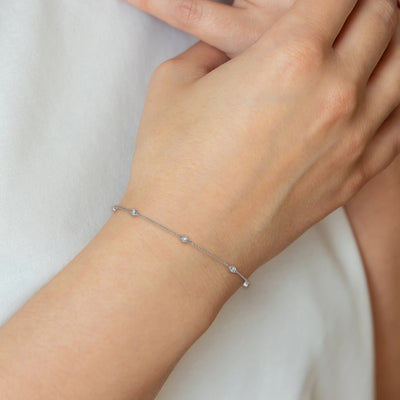 14K White Gold Complete 1/8 carat Bezel-set Diamond and Cable Chain 7-Station Anklet