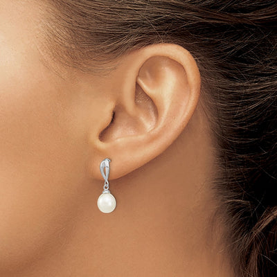 Sterling Silver Rhodium-plated White Rice Freshwater Cultured Pearl Post Dangle Earrings, 19 x 7 to 8mm