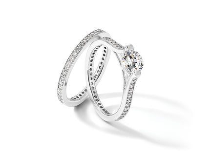 Sterling Silver Rhodium-plated CZ Eternity Engagement Ring and Band Set
