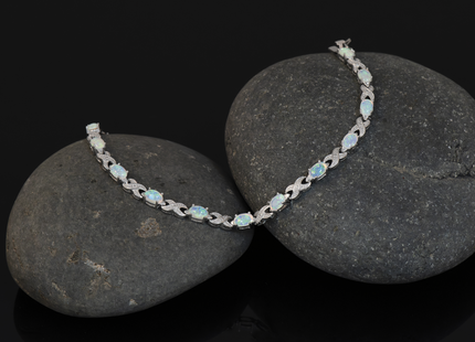 Sterling Silver Rhodium Plated 7. Created Opal XO Bracelet