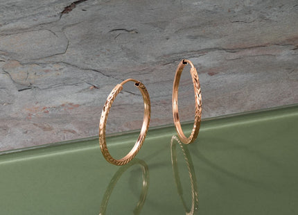 14K rose gold hoop earrings, further view