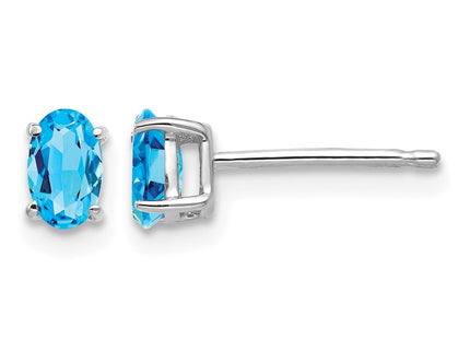 14K white gold blue topaz oval earrings