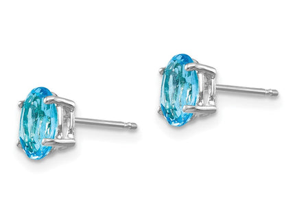 14k White Gold Oval Blue Topaz Earrings (Style XE87WBT)