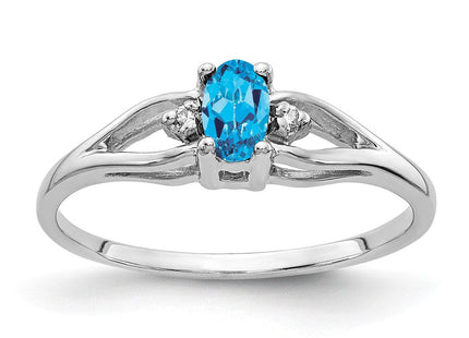 14K White Gold 5x3mm Oval Blue Topaz and A Diamond 3 Stone Ring