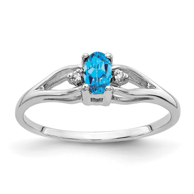14K White Gold Oval Blue Topaz A Diamond ring