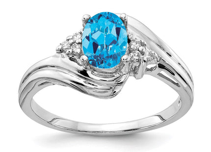 14K White Gold 7x5mm Oval Blue Topaz and 1/15 carat VS Diamond Ring