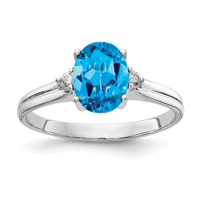 14K White Gold Oval Blue Topaz A Diamond ring