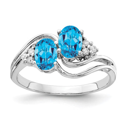 14K White Gold Oval Blue Topaz A Diamond ring