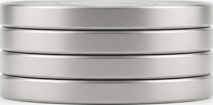 four nickels stacked