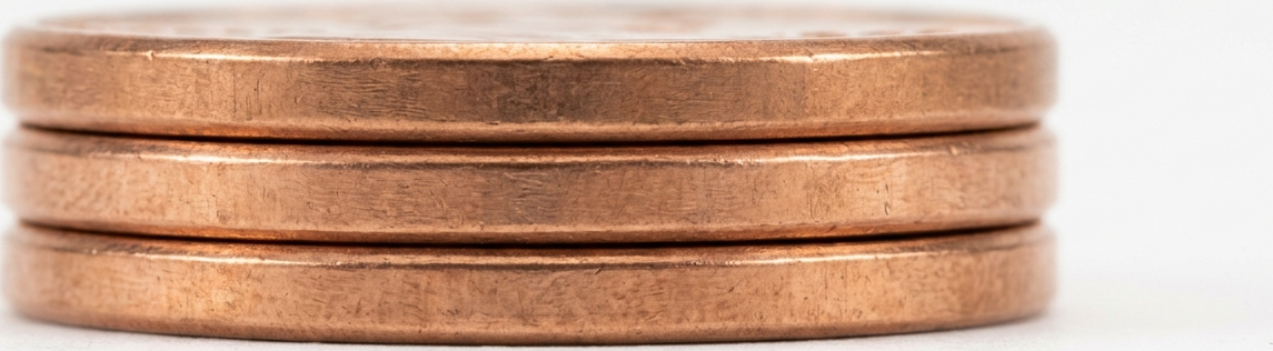 three pennies stacked